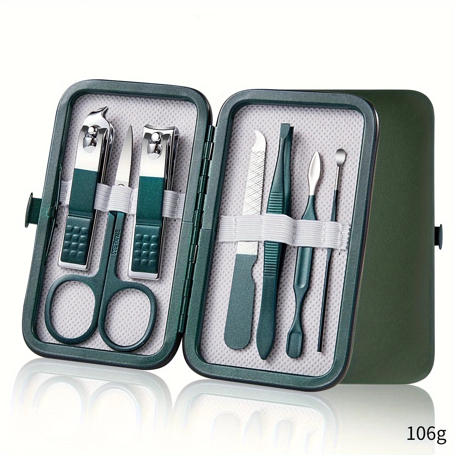 Manicure set with green tools in a case on a white background