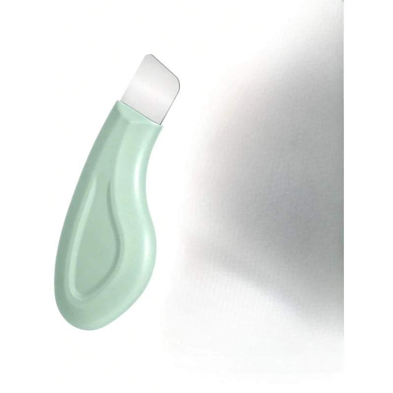 Mint green and white bottle on a reflective surface