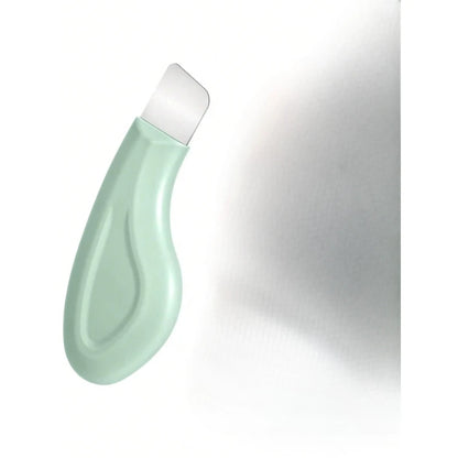 Mint green and white bottle on a reflective surface